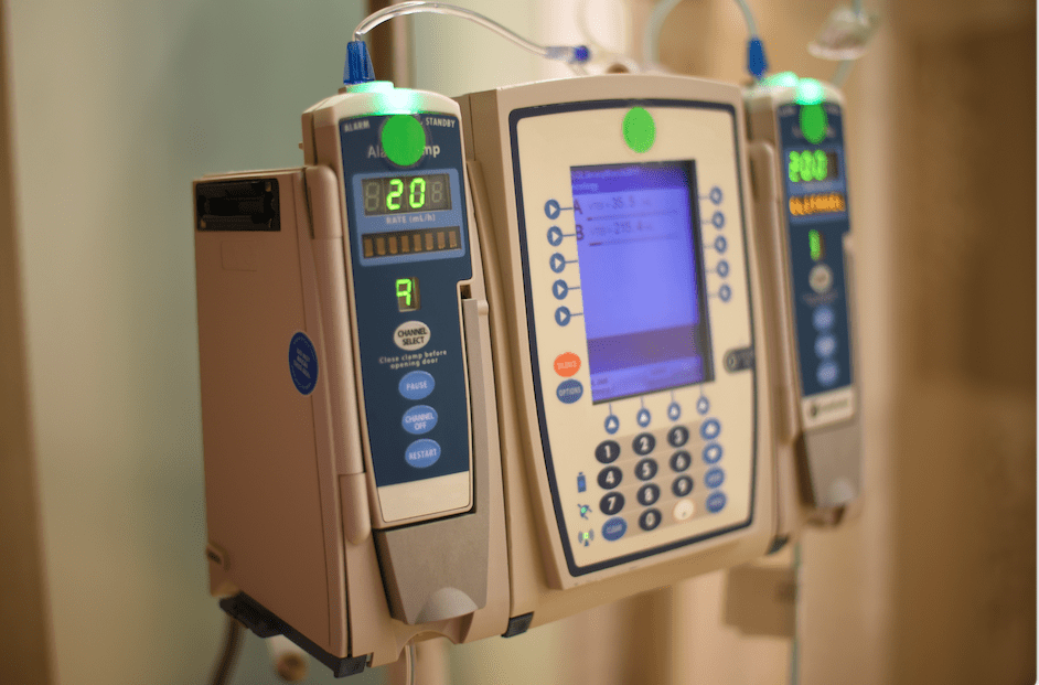 A row of medical equipment on display in a room.